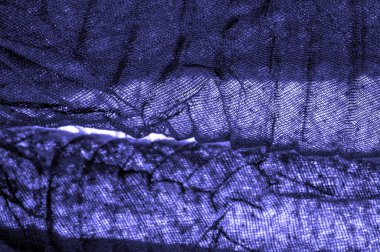 Doku. Geçmişi. Geçmişi. Koyu mavi kumaş dokusu parlak, soyut bir ipek kumaş arkaplanı..