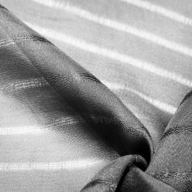 Çizgileri olan basit gri kumaş. İpin, dokunun, arkaplanın çıkarılması ile oluşturulan çizgiler