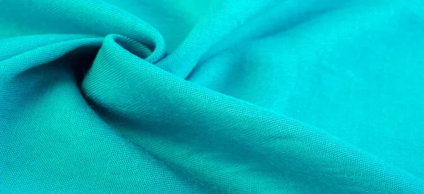 蓝绿色面料 用螺纹对角线编织的薄织物 从拉丁文和法文 材料的名称是Transla Texture — 图库照片