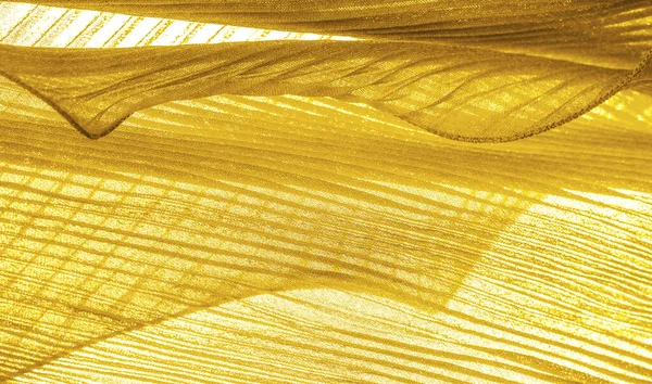 ウェブ テクスチャ イエローゴールドの布 起伏のあるリップル波 — ストック写真