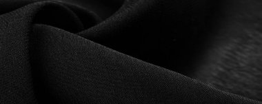 Doku. Geçmişi. Geçmişi. Siyah gri saten kumaş dokusu. Lüks parlak. Soyut ipek kumaş arka plan..