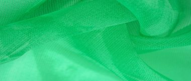 Yeşil ipek kumaş, zümrüt ipekten soyut arkaplan. Kumaşlı kumaş. Uzayı kopyala Tasarım elemanı. Sevgililer Günü. Doku deseni, süs, arkaplan