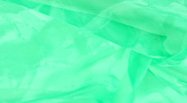 Yeşil ipek kumaş, zümrüt ipekten soyut arkaplan. Kumaşlı kumaş. Uzayı kopyala Tasarım elemanı. Sevgililer Günü. Doku deseni, süs, arkaplan