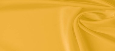 Sarı ipek kumaş. Çok hafif, dupioni ipek kumaşlı, bol kumaşlı ve ince bir mat pırıltısı olan yumuşak desenli. Tasarım aksanınız için mükemmel..