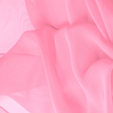 İpek kırmızı polyester. Pembe ipek kumaşın arka planı. Şeffaf arkaplan ve elbise dikmek için açık kumaştan yapılmış. Tekstil panoraması. Dokuma. şablon.