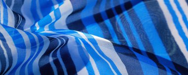 çok renkli çizgili ipek kumaş. Meksika renklendirme temalı soyut çizgili parlak çizgili desen. Arkaplan dokusu. 