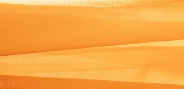 Sarı ipek kumaş. Tasarımlarınız, aksanlarınız, duvar kağıtlarınız, posterleriniz ve kartpostallarınız için mükemmel. doku arkaplan deseni.