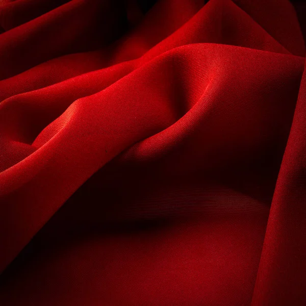 缎子红丝是一种织物 通常有光滑的表面和衬垫 缎子织物的特点是有四个或更多的填充物或纬线 — 图库照片