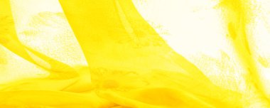 Sarı ipek kumaşlı, çiçekli, çiçekli. Renkli bir kompozisyonda bir sürü soluk çiçek. Arkaplan dokusu