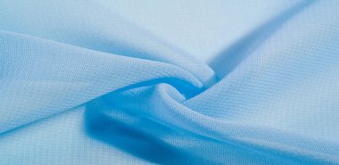 Mavi, akuamarin ipek kumaş. Tasarımlarınız, aksanlarınız, duvar kağıtlarınız, posterleriniz ve kartpostallarınız için mükemmel. doku arkaplan deseni.