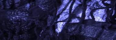 Doku. Koyu mavi kumaş. Noel kadınsı kraliyet partisi için dekoratif bir altyapı. Şatafatlı, deri desenli duvar kağıdı desenli. Doğum günü davetiyeleri için arka plan. Açık pastel renk