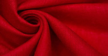 Kırmızılı keten kumaş. Keten kumaş lüks olarak kabul edilir çünkü keten fabrikasından işlemek zahmetli ve zahmetli bir iştir. - Güzel, dayanıklı ve sonsuza kadar çekici..