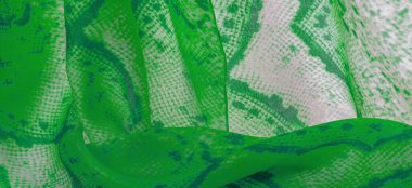 Yılan derisi desenli yeşil kumaş, parlak yeşil kumaşın arka plan dokusu yakın. arkaplan, doku, desen