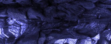 Doku. Koyu mavi kumaş. Noel kadınsı kraliyet partisi için dekoratif bir altyapı. Şatafatlı, deri desenli duvar kağıdı desenli. Doğum günü davetiyeleri için arka plan. Açık pastel renk