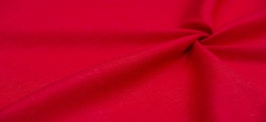 Kırmızılı keten kumaş. Keten kumaş lüks olarak kabul edilir çünkü keten fabrikasından işlemek zahmetli ve zahmetli bir iştir. - Güzel, dayanıklı ve sonsuza kadar çekici..