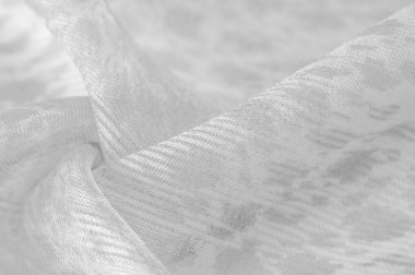 Beyaz ipek kumaş tekstil ürünüdür. Özellikleri, daha esnek ve tasarlanması daha kolay olduğu için dokuma malzemesinden farklıdır. doku, arkaplan, tıkırtı