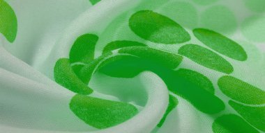  Yeşil benekli desenli ipek kumaş. Doku Arkaplanı