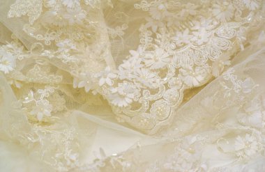 Yumuşak bej dantelli. Doku. Geçmişi. şablon. Soluk bej çubuklu, eski dantelli ve krem çizgili soyut bir arka plan. Kartpostal, poster, doku veya duvar kağıdı olarak kullanılabilir