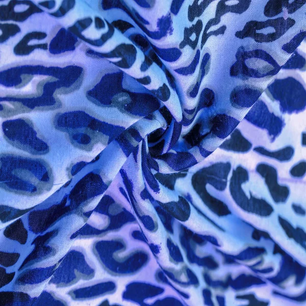 blue silk fabric, leopard print, animal skin, African theme. texture background, pattern