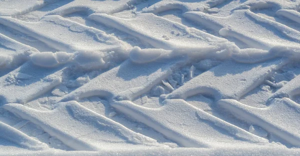Tire Tread Marks Snow Covered Ground Sunny Day Soon Warm — Stock Photo, Image