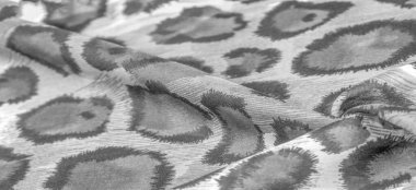 Tek renkli ipek kumaş, çita derisi, Afrika savanı teması. Arkaplan dokusu, desen