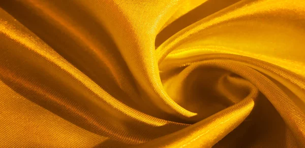 黄色の絹織物 この愛らしい 柔らかく光沢のある生地は 滑らかなミンクの表面を持っており あなたのプロジェクトを作成するのに最適です テクスチャ背景 — ストック写真