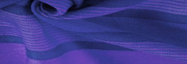 İpek kumaş gök mavisi, parlak mavi, bulutsuz bir gökyüzü gibi. Doku. Arkaplan.