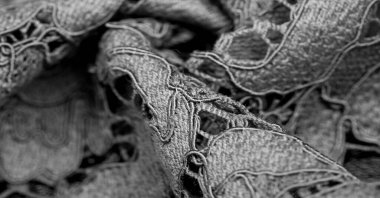 Siyah dantel kumaş, kabartmalı dantel kumaş, her iki tarafında da istiridye. Projeleriniz için uygun, tasarım, vesaire. Doku, arkaplan