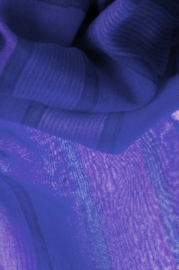 İpek kumaş gök mavisi, parlak mavi, bulutsuz bir gökyüzü gibi. Doku. Arkaplan.