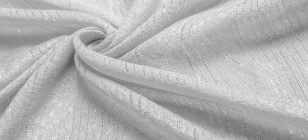 Kumaş, pullu beyaz altın, gümüş kripton çizgili beyaz şerit, tasarımcı kumaşı. Doku, arkaplan