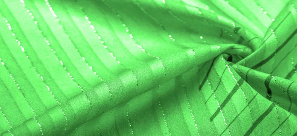 Lurexストライプの緑のエメラルドファブリックは 新鮮で快適なスタイルに最適です 背景色のデザイン — ストック写真
