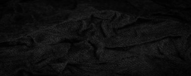 Siyah yünlü kumaş. Uzun, dayanıklı, kalın iplikli koyunlar, özellikle senin tasarımına uygun. İngiliz kökenli çeşitli büyük kuzu türleri gibi. Desen arkaplan deseni