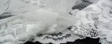 Beyaz dantel. Eşsiz tasarım, el yapımı siyah beyaz esnek dantel. Aksesuarlar. Zarif, sakin, saf kumaş. Jacquard. Yüksek kaliteli el yapımı aksesuarlar. İç çamaşırı kumaşları