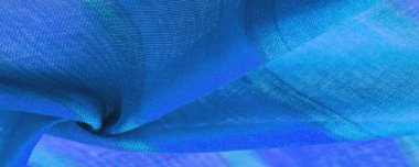 Mor çizgili mavi kumaş, projeleriniz için kalın ve parlak bir kumaş. Çok çeşitli renklerde yumuşak düzlükler. Doku, arkaplan