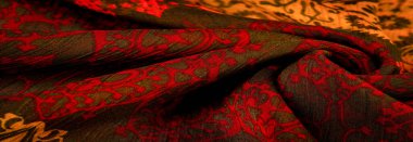 Çiçek desenli ve eşkenar dörtgenli ipek kahverengi. Yumuşak kumaş, parlak doku arka plan, saten arka plan, kumaş lüks iş, zarif desen, renkli soyut, renkli kadife, makro dilimlenmiş.