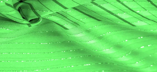 Lurexストライプの緑のエメラルドファブリックは 新鮮で快適なスタイルに最適です デザイン — ストック写真