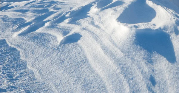 Schnee Textur Einem Sonnigen Tag Der Wind Schuf Wunderliche Muster Stockfoto