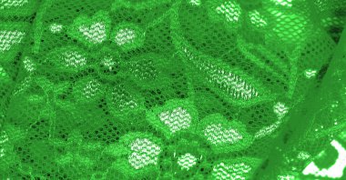 Green lace. This stunning and sophisticated fabric will be a true work of art. Intense green with delicate lace patterns that we love so much; unique, elegant and vibrant.