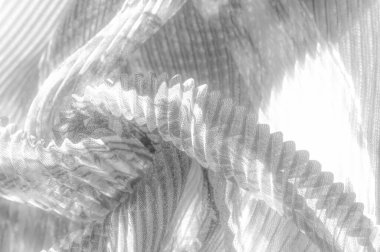 silk crimped. Blue, yellow, brown, burgundy colors. Ruffled silk fabric in vintage style. Floral pattern for elasticity. Opens the gathered fabric into pleasing and flattering folds.