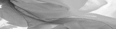 Tek renkli ipek kumaş, zarif, dalgalı, siyah beyaz saten ipek kumaş, soyut tasarım. arkaplan dokusu, desen