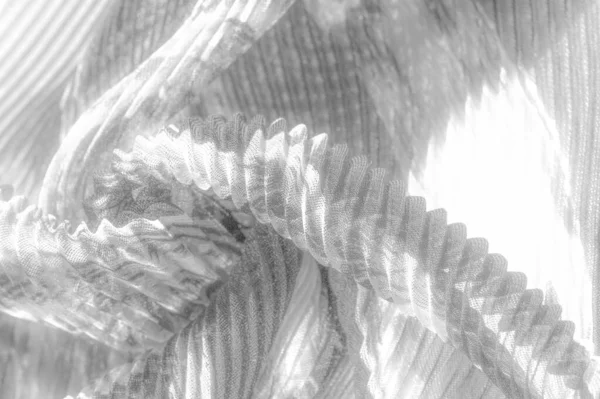 silk crimped. Blue, yellow, brown, burgundy colors. Ruffled silk fabric in vintage style. Floral pattern for elasticity. Opens the gathered fabric into pleasing and flattering folds.