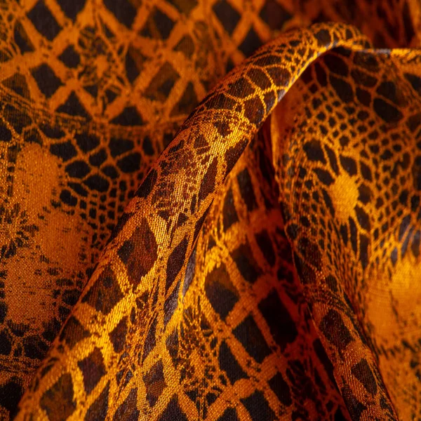 Kahverengi dantel kumaş, kehribar ve siyah kumaş karışımı. Kehribar, doku, arkaplan, desen.