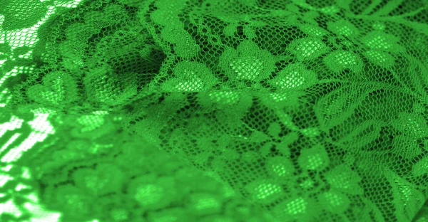 Green lace. This stunning and sophisticated fabric will be a true work of art. Intense green with delicate lace patterns that we love so much; unique, elegant and vibrant.