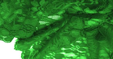 Green lace. This stunning and sophisticated fabric will be a true work of art. Intense green with delicate lace patterns that we love so much; unique, elegant and vibrant.