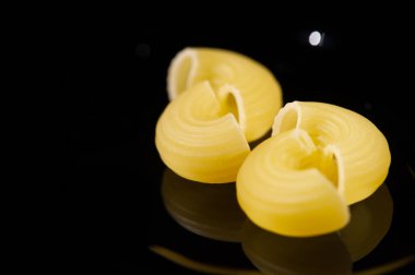 pasta, Chifferi Short and wide pasta. Pipe Doppia Rigatura. Can be smooth lisse or grooved rigati.