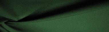 Zümrüt ipek kumaş, bu ipek saten dokuma. Yoğunluk, pürüzsüzlük ve ön tarafın parlaklık, yumuşaklık, doku, arka plan farkları