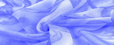 blue fabric texture with abstract blue print. luxury as abstract background. Luxury Christmas background. Fabric, delicate. Texture, Pattern. Smooth elegant