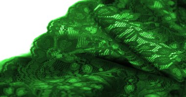 Green lace. This stunning and sophisticated fabric will be a true work of art. Intense green with delicate lace patterns that we love so much; unique, elegant and vibrant.