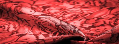 Çiçek desenli kırmızı ipek kumaş, güzel görünüş, eşsiz parlaklık kabartmalı desen, bileşik tekstil. rahatlama deseni