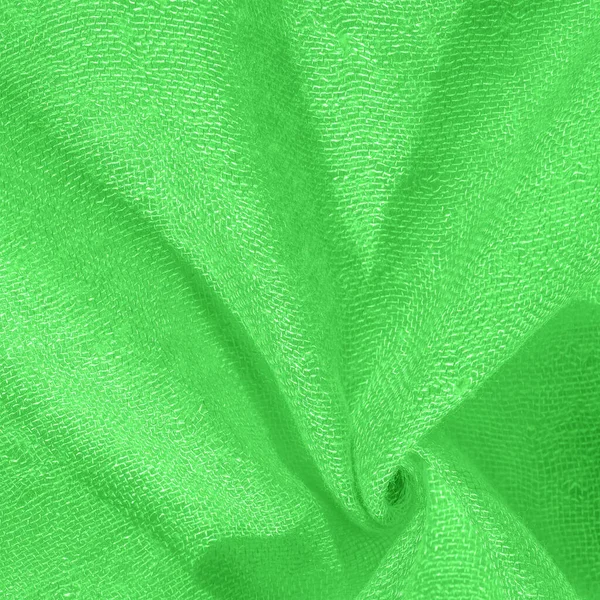 Parlak yeşil malzeme. Bu ipek son derece pürüzsüz ve yumuşak, güzel pürüzsüz bir dokusu var. arkaplan deseni